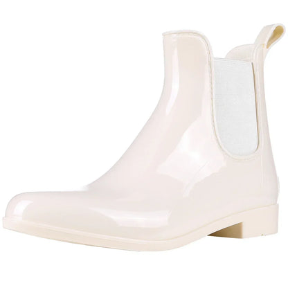Elegantes botas de agua brillantes
