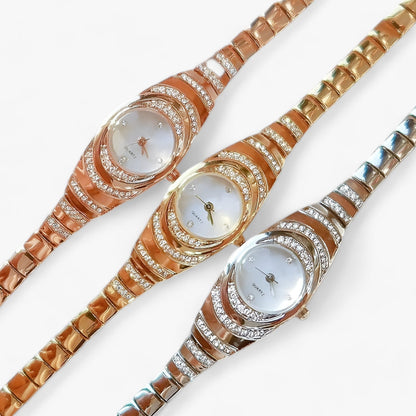 Women's quartz watch with crystal and diamond accents and luxury appearance