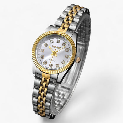 Elegant round watch with gold bracelet